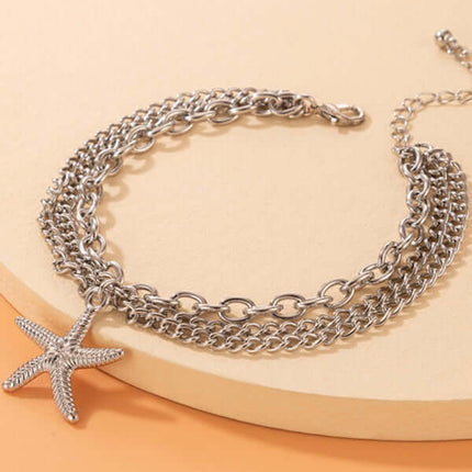 Gold Heart Snake Charm Tassel Layered Anklet Set for Women ankle close detail