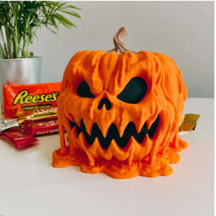 Halloween Melting Pumpkin Candy Bowl With Lid featuring a spooky dripping design, perfect for Halloween treats.