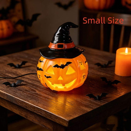 Halloween Night Light USB Powered Pumpkin Lamp on a wooden table, showcasing a small size with a witch hat and bat decorations.