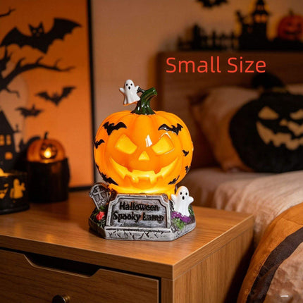 Halloween Night Light USB Powered Pumpkin Lamp with spooky ghosts, perfect for Halloween decor in a cozy bedroom.