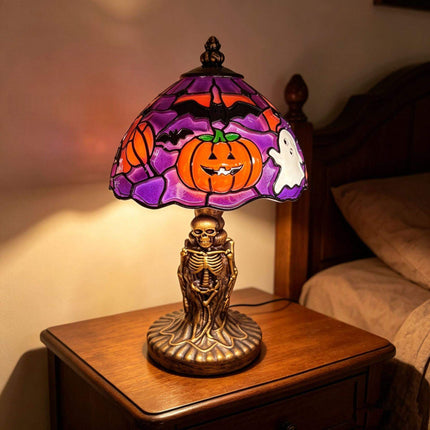 Halloween Night Light USB Powered Pumpkin Lamp with skeleton base and colorful shade featuring pumpkins, ghosts, and bats.
