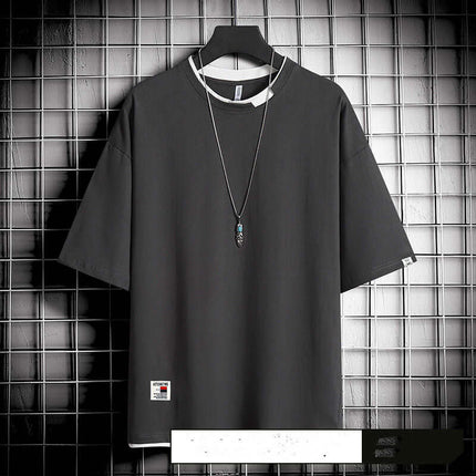 Hong Kong style loose T-shirt men trendy short sleeve cuffs alignment capturing cozy oversized urban aesthetics