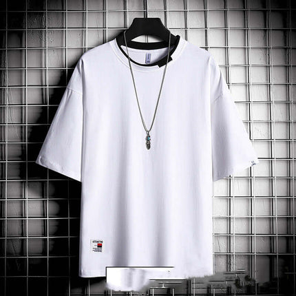 Hong Kong style loose T-shirt men clean double hemmed border stitching proving solid industrial manufacturing standards