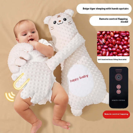 Infant Remote Controlled Cartoon Soothing Sleep Pillow with beige tiger design, baby holding it, remote control model