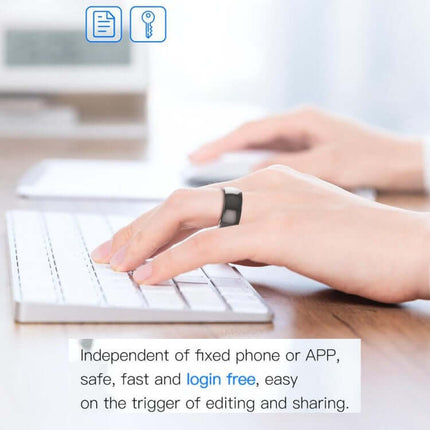 Hand wearing JAKCOM R4 Smart Ring Multifunctional Wearable while typing on a keyboard, highlighting its login-free function.