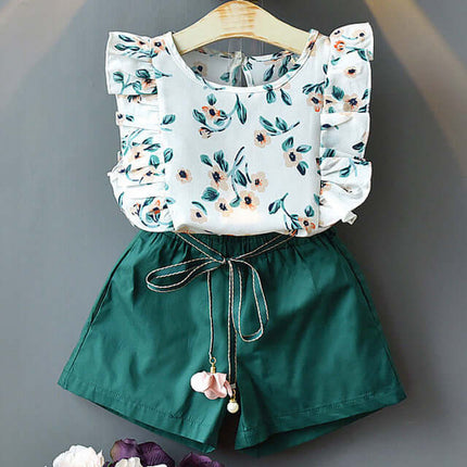 Kids Girls T Shirt And Shorts Two Piece Summer Set featuring floral top and green shorts.