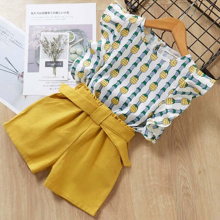 Kids Girls T Shirt And Shorts Two Piece Summer Set featuring pineapple print top and yellow shorts