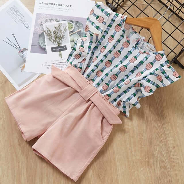 Kids Girls T Shirt And Shorts Two Piece Summer Set featuring a stylish floral top and pink shorts.