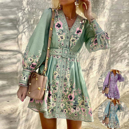 Ladies Fashion Loose Printed Boho Dress in green with floral design, paired with a stylish handbag.