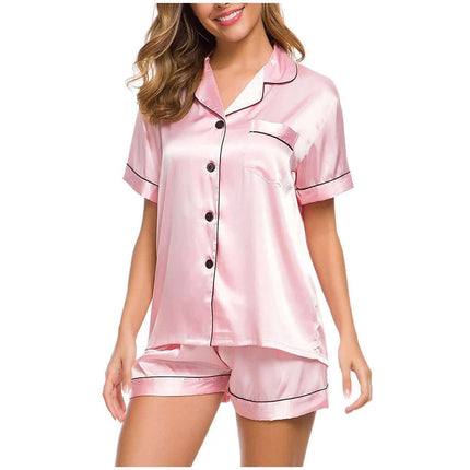 Ladies Short Sleeve Nightwear Casual Pajama Set in pink satin with black trim.