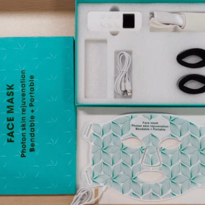LED Silicone Face Neck Mask Light Therapy Apparatus showing the mask, remote, and accessories in packaging.