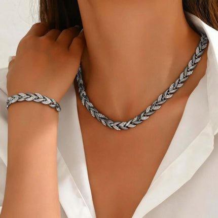 Luxury Fish Tail Diamond Necklace & Bracelet Set worn by a model, showcasing elegant silver design and intricate details.