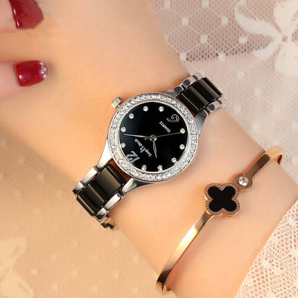 Luxury Women Quartz Watch Ceramic Diamond Ladies Gift on wrist with black and silver design and a bracelet
