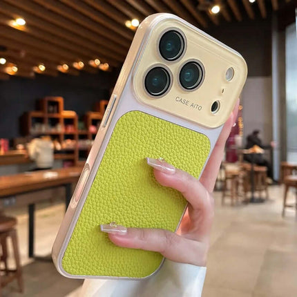 Lychee pattern Phone Case Full body Coverage with bright yellow textured design and camera protection in a chic setting.