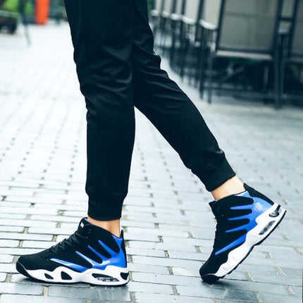 Men Air Cushion Wear-Resistant Basketball Sneakers in black and blue, showcasing stylish athletic design on a city street.