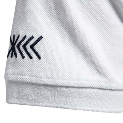 Men Casual Embroidered Breathable Short Sleeve Polo high density detailed embroidery crest accent close up shot
