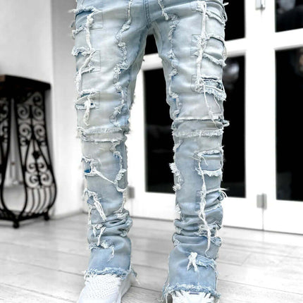 Men Ripped Stacked Slim Fit Jeans Streetwear showcasing a distressed design with ripped details and a slim fit.