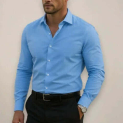 Mens Business Button Down Long Sleeve Vacation Shirt in light blue, worn by a man with a stylish look.