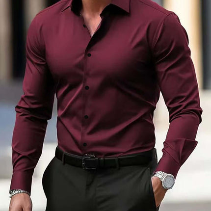 Mens Business Button Down Long Sleeve Vacation Shirt in burgundy with buttons and long sleeves, paired with black trousers.