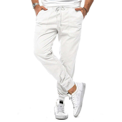 Men's Casual Loose Tapered Jogger Trousers paired with crisp running sneakers to exemplify contemporary urban athleisure styles