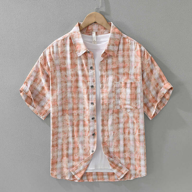 Mens Fashionable Plaid Short Sleeve Shirt displayed on a hanger with a light background.