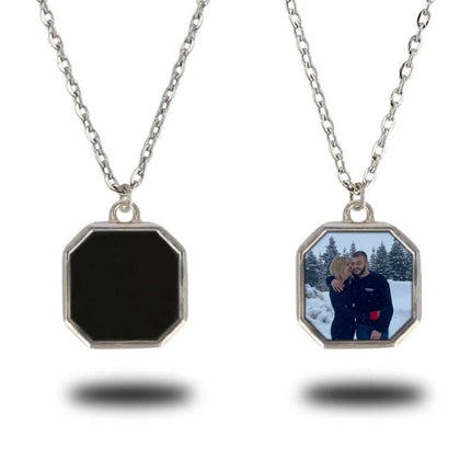 Metal Geometric Block Magic Necklace featuring a photo locket with a couple in a snowy landscape on one side.