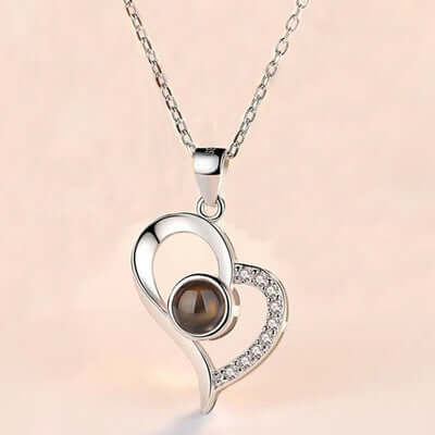 Metal Rose Jewelry Gift Box with Crystal Necklace featuring a heart-shaped pendant.