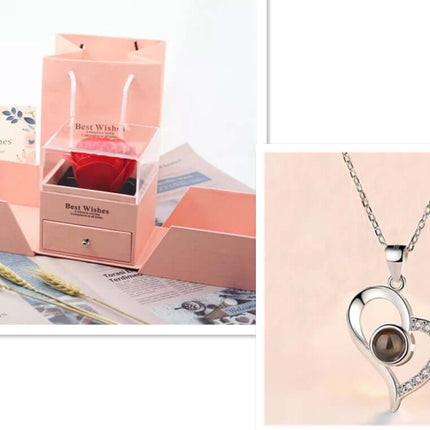 Metal Rose Jewelry Gift Box with Crystal Necklace set in an elegant pink box showcasing a stunning heart pendant.