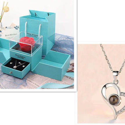 Metal Rose Jewelry Gift Box with Crystal Necklace displayed alongside elegant storage and jewelry.