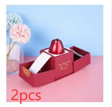 Metal Rose Jewelry Gift Box with Crystal Necklace displayed in an elegant setting featuring two cute decorations.