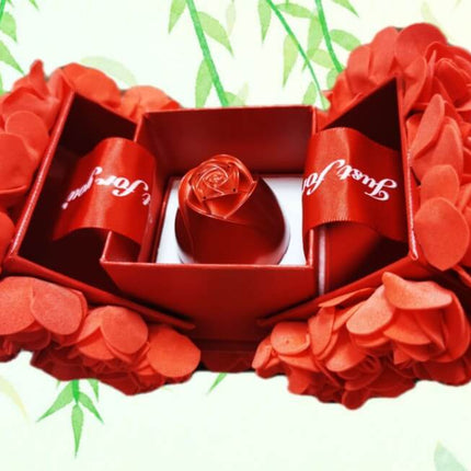 Metal Rose Jewelry Gift Box with Crystal Necklace featuring a decorative rose and red petals.