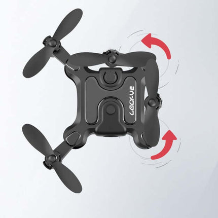 Mini Folding Drone 4K HD Aerial Photography UAV in flight showcasing its compact design and propellers.