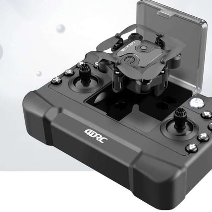 Mini Folding Drone 4K HD Aerial Photography UAV controller with drone in charging position