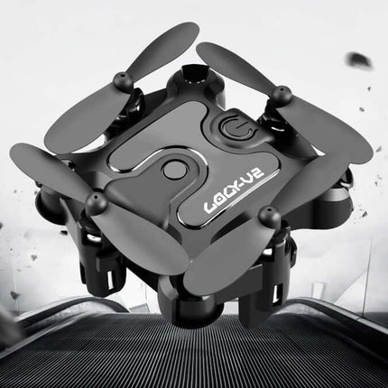 Mini Folding Drone 4K HD Aerial Photography UAV hovering against a sleek background with spinning propellers.
