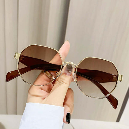 Modern Square Polygon Metal Sunglasses Full Frame UV400 in hand with brown lenses and gold frame