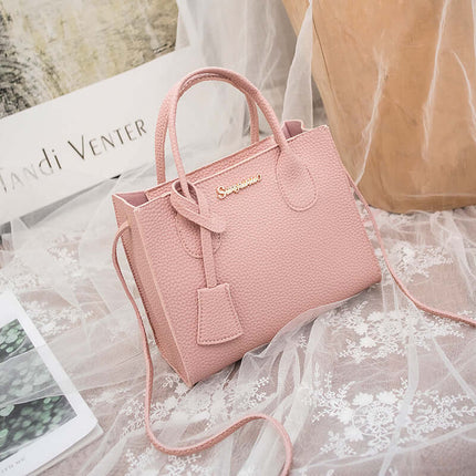 New Product Personality Messenger Phone Shoulder Bag in soft pink leather with stylish handles and detachable strap.