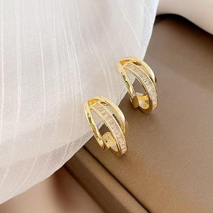 New Trendy Womens High grade Geometric Zircon Earrings in gold with a unique geometric design, showcasing sparkling zircon.