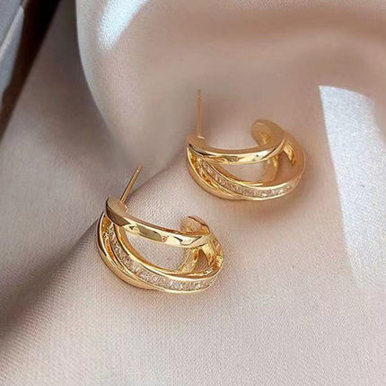 New Trendy Womens High grade Geometric Zircon Earrings featuring a stylish gold design with intricate details.