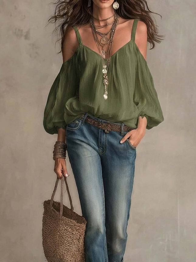 Off Shoulder Strapless Bubble Sleeved Resort Blouse in olive green, paired with jeans and accessories, exuding a relaxed resort style.
