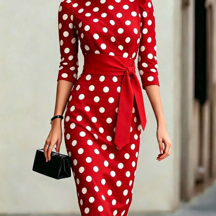 Polka Dot Belted Midi Pencil Dress For Women in red with white spots, featuring a bow at the waist and three-quarter sleeves.