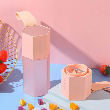 alt="Portable Wireless Blender-Pure Fruit Electric Juicer Cup in hand"