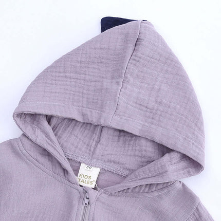 Close-up of the hood of the Rabbit Ears Baby Romper made from soft cotton blend fabric.