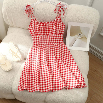 Floral Print Summer Sweet A Line Mini Dress on a cozy chair with a picture nearby.