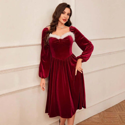 Red velvet square neck long sleeve maxi dress displayed on a model, featuring a refined neckline and elegant sleeves.