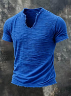 Retro Cotton Linen T Shirt With Feathered Hem V Neck Tops in blue with textured fabric and frayed edges.
