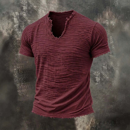 Retro Cotton Linen T Shirt With Feathered Hem V Neck Tops in burgundy color with a unique textured design.