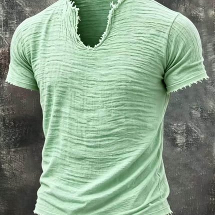 Retro Cotton Linen T Shirt With Feathered Hem V Neck Tops in mint green color, featuring a textured fabric and distressed edges.
