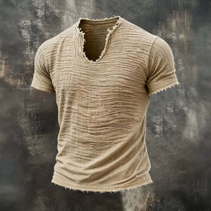 Retro Cotton Linen T Shirt With Feathered Hem V Neck Tops displayed on a textured background, showcasing its unique style.