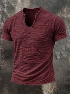 Retro Cotton Linen T Shirt With Feathered Hem V Neck Tops in deep maroon with textured fabric and distressed hem.