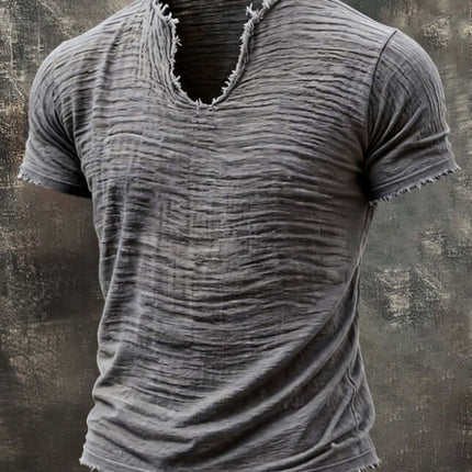 Retro Cotton Linen T Shirt With Feathered Hem V Neck Tops in a distressed gray fabric with a unique hem design.